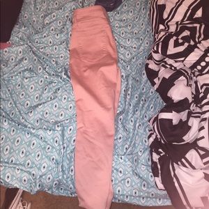 High-wasted pink jeans